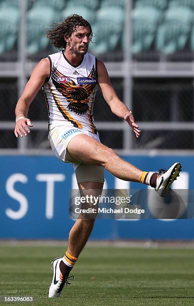 Matthew Spangher of the Hawthorn Hawks kicks the ball during the round three NAB Cup AFL match between the Hawthorn Hawks and the Richmond Tigers at...