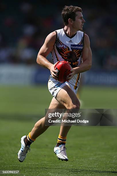 Jonathan Simpkin of the Hawthorn Hawks runs with the ball during the round three NAB Cup AFL match between the Hawthorn Hawks and the Richmond Tigers...
