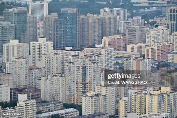 General view shows residential and commercial buildings in Beijing on August 30, 2023.