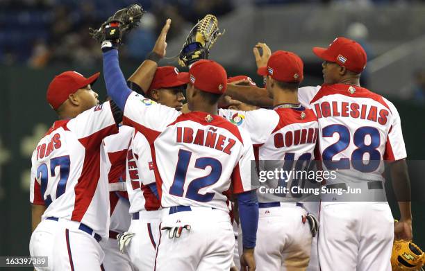 Infielder Andy Ibanez, Yasmany Tomas, Yulieski Gourriel, pitcher Raciel Iglesias and other players celebrate victory over Chinese Taipei in the World...