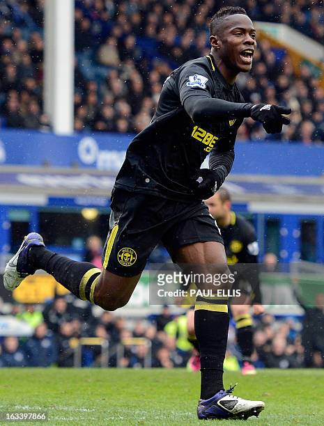 Wigan Athletic's Honduran defender Maynor Figueroa celebrates scoring during the English FA Cup quarter-final football match between Everton and...