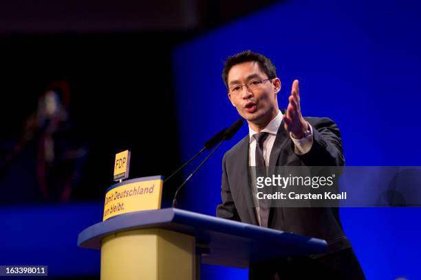 Philipp Roesler, German Economy Minister and Chairman of the German Free Democrats political party, speaks to delegates at the FDP federal convention...
