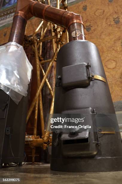 The stoves are installed inside the Sistine Chapel before the papal conclave on March 9, 2013 in Vatican City, Vatican. Cardinals are set to enter...