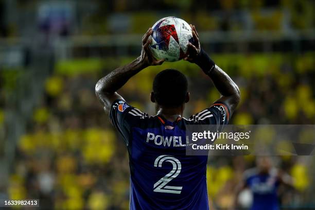 Alvas Powell of FC Cincinnati prepares to throw in the ball during the match against the Columbus Crew at Lower.com Field on August 20, 2023 in...