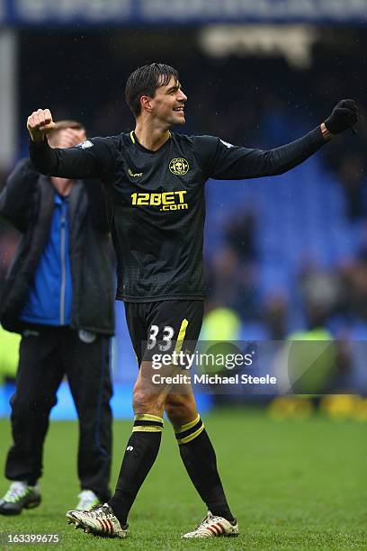 Paul Scharner of Wigan Athletic celebrates at the final whistle after his sides 3-0 victory during the FA Cup Sixth Round match between Everton and...