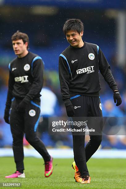 Ryo Miyaichi of Wigan Athletic warms up ahead of the FA Cup Sixth Round match between Everton and Wigan Athletic at Goodison Park on March 9, 2013 in...