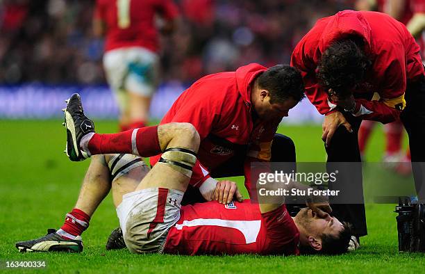 Ryan Jones of Wales receives treatment during the RBS Six Nations match between Scotland and Wales at Murrayfield Stadium on March 9, 2013 in...