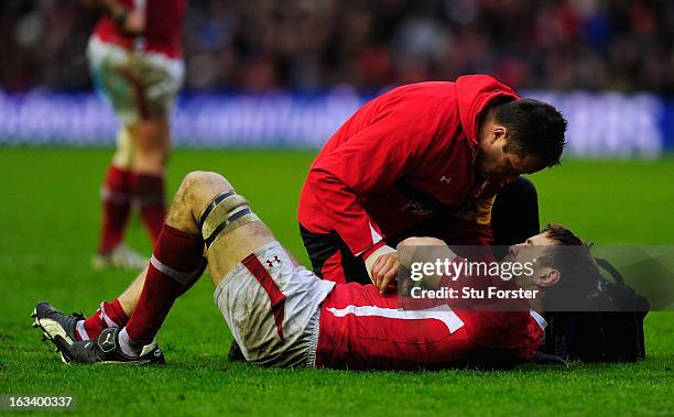 Ryan Jones of Wales receives treatment during the RBS Six Nations match between Scotland and Wales at Murrayfield Stadium on March 9, 2013 in...