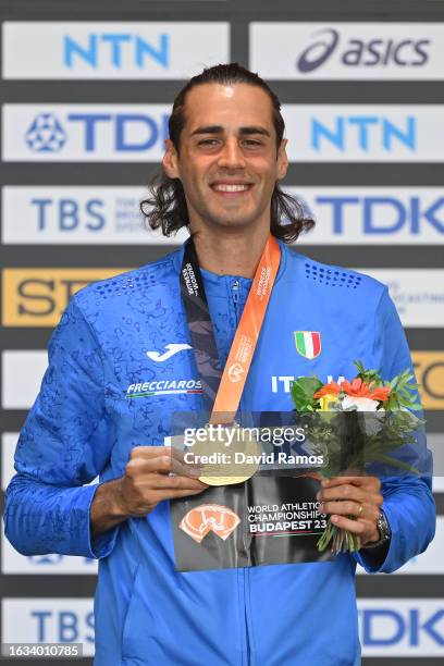 Gold medalist Gianmarco Tamberi of Team Italy celebrates on the podium after the Men's High Jump Final during day five of the World Athletics...