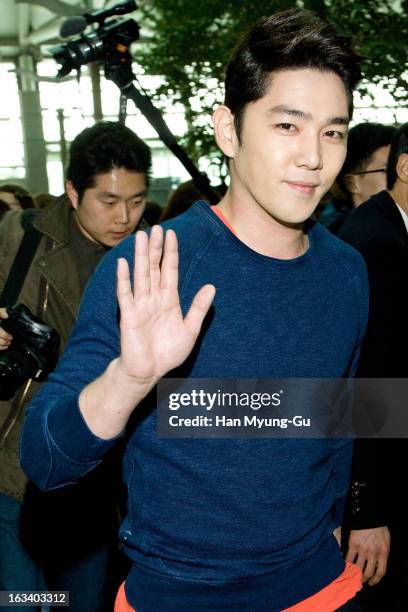 Kangin of South Korean boy band Super Junior is seen on departure at Incheon International Airport on March 8, 2013 in Incheon, South Korea.