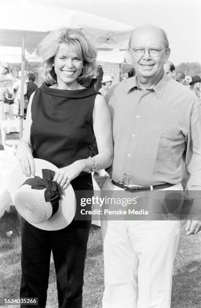 Betsy McCaughey and Wilbur Ross attend Family Day, benefitting the Hole in the Wall Gang, during the Polo Hamptons match at Bridgehampton Polo Club...