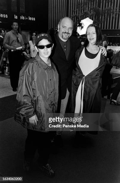 Max Minghella, Anthony Minghella, and Carolyn Choa attend the local premiere of "Cop Land" at the Ziegfeld Theatre in New York City on August 6, 1997.