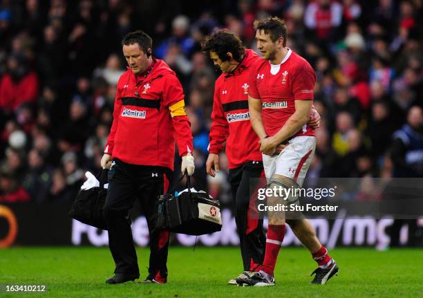 Ryan Jones of Wales goes off injured during the RBS Six Nations match between Scotland and Wales at Murrayfield Stadium on March 9, 2013 in...