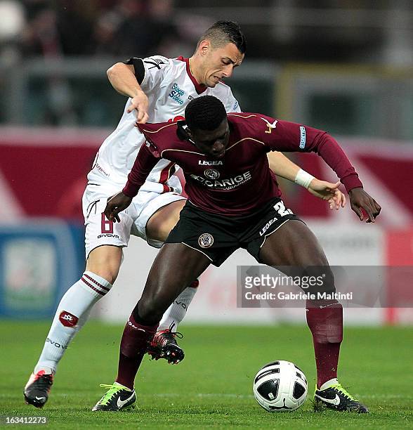 Joseph Alfred Duncan of AS Livorno battles for the ball with Federico Gerardi of Reggina Calcio during the Serie B match between AS Livorno and...