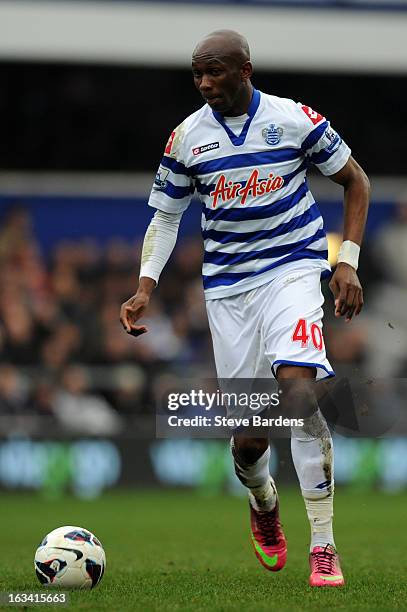 Stephane Mbia of Queens Park Rangers in action during the Barclays Premier League match between Queens Park Rangers and Sunderland at Loftus Road on...