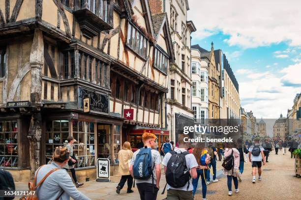 downtown oxford england uk cornmarket shopping street - oxford stock pictures, royalty-free photos & images