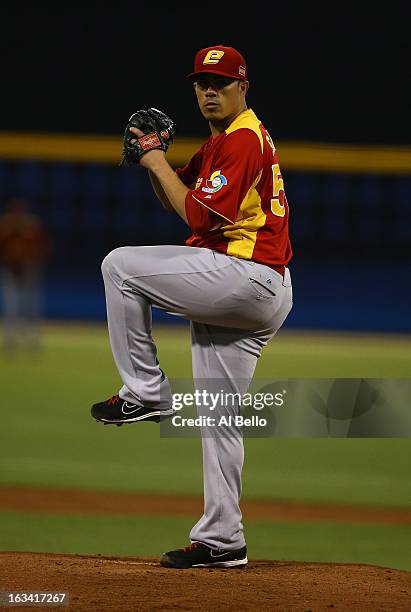 Sergio Perez of Spain pitches against Puerto Rico during the first round of the World Baseball Classic at Hiram Bithorn Stadium on March 8, 2013 in...