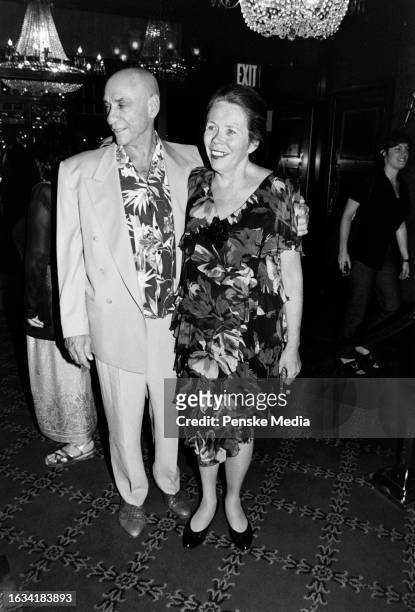 Murray Abraham and Kate Hannan attend the local premiere of "Mimic" at the Ziegfeld Theatre in New York City on August 19, 1997.
