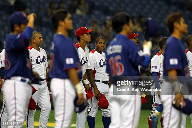 Cuba team line up for national anthem during the World Baseball Classic Second Round Pool 1 game between Chinese Taipei and Cuba at Tokyo Dome on...