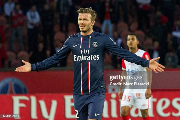 David Beckham of PSG reacts during the French Ligue 1 match between Paris Saint-Germain FC and Nancy FC at Parc des Princes on March 9, 2013 in...