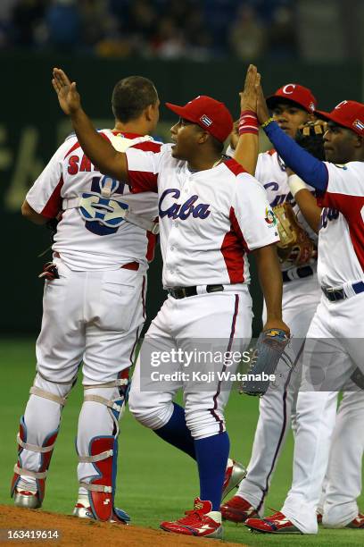 Outfielder Alfredo Despaigne of Cuba celebrate after winning during the World Baseball Classic Second Round Pool 1 game between Chinese Taipei and...
