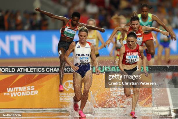 Alice Finot of Team France and Luiza Gega of Team Albania compete in the Women's 3000m Steeplechase Heats during day five of the World Athletics...