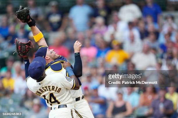 Victor Caratini of the Milwaukee Brewers catches ball hit by Royce Lewis of the Minnesota Twins in the first inning at American Family Field on...