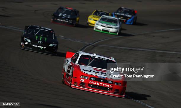 Sam Hornish Jr., driver of the Wurth Ford, leads the field during the NASCAR Nationwide Series Sam's Town 300 at Las Vegas Motor Speedway on March 9,...