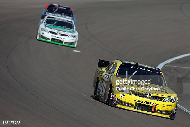 Brian Vickers, driver of the Dollar General Toyota, leads the field during the NASCAR Nationwide Series Sam's Town 300 at Las Vegas Motor Speedway on...