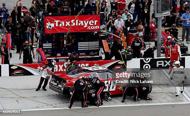 Dale Earnhardt Jr., driver of the TaxSlayer.com Chevrolet, pits during the NASCAR Nationwide Series Sam's Town 300 at Las Vegas Motor Speedway on...