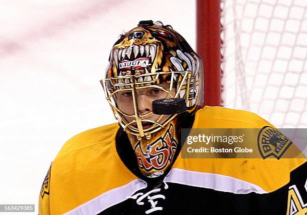 Boston Bruins goalie Tuukka Rask makes a face mask save during the second period as the Boston Bruins host the Philadelphia Flyers at TD Garden.