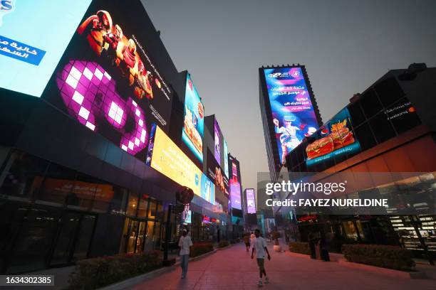 People visit the Boulevard entertainment city in Riyadh on August 29, 2023.