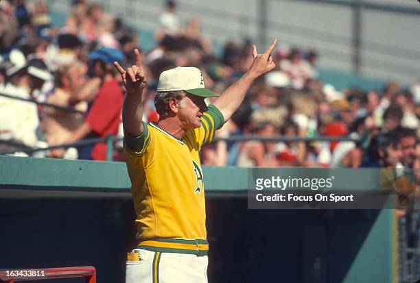 Manager Chuck Tanner of the Oakland Athletics looks on from in front of the dugout during an Major League Baseball game against the Minnesota Twins...