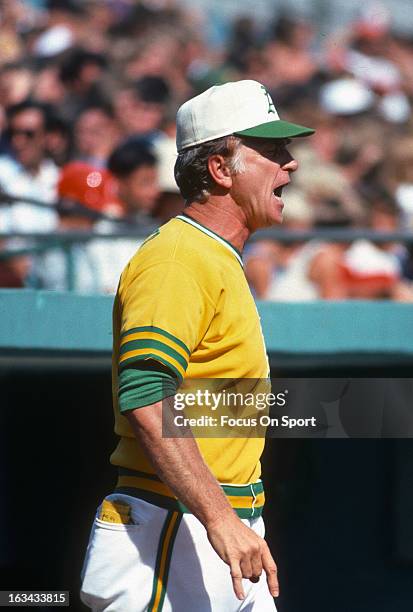 Manager Chuck Tanner of the Oakland Athletics looks on from in front of the dugout during an Major League Baseball game against the Minnesota Twins...