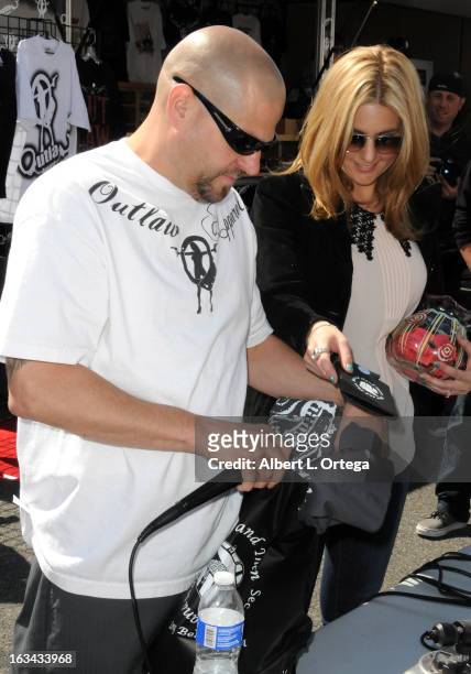 Personalities Jarrod Schulz and Brandi Passante attend the "Storage Wars" Cast Store Opening held at Now & Then Second Hand Store on March 9, 2013 in...