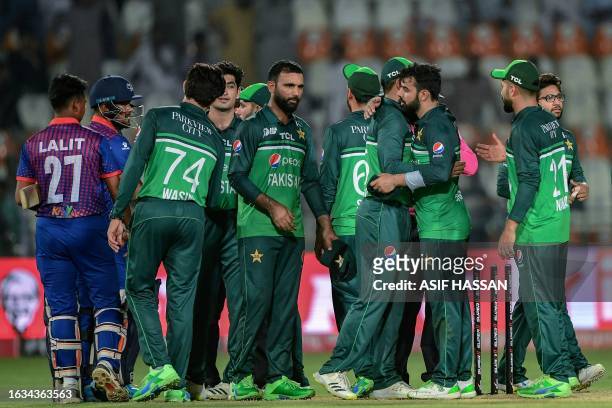 Pakistan's players celebrate after winning the Asia Cup 2023 cricket match between Pakistan and Nepal at the Multan Cricket Stadium in Multan on...