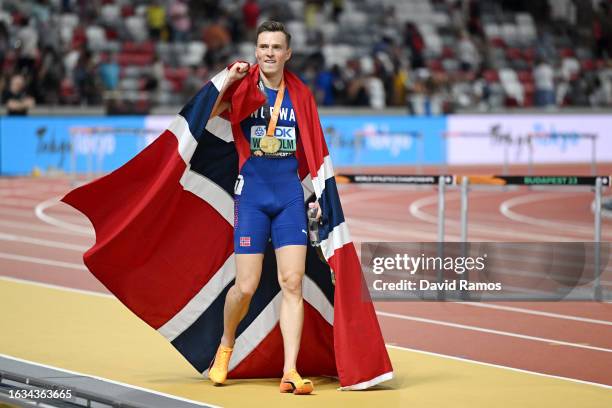 Karsten Warholm of Team Norway celebrates winning the Men's 400m Hurdles Final during day five of the World Athletics Championships Budapest 2023 at...