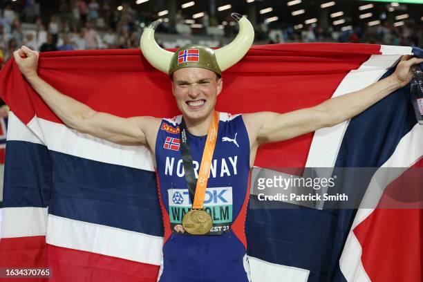 Karsten Warholm of Team Norway celebrates wearing a viking hat winning the Men's 400m Hurdles Final during day five of the World Athletics...