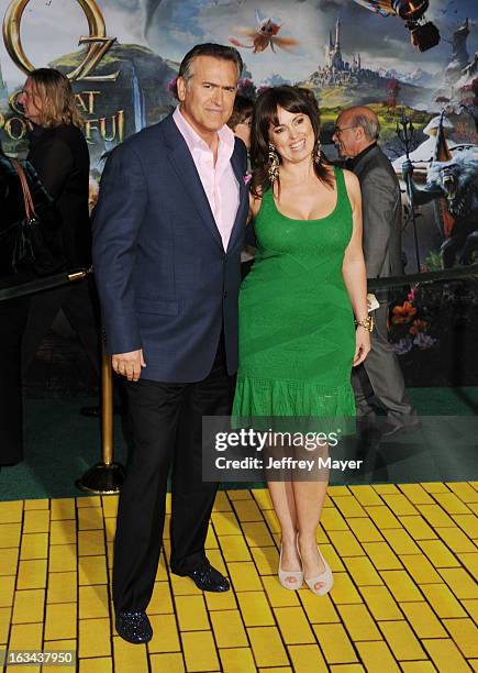 Bruce Campbell and Ida Gearon attend the world premiere of Disney's 'OZ The Great And Powerful' at the El Capitan Theatre on February 13, 2013 in...