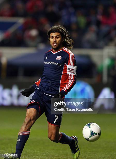 Juan Toja of New England Revolution moves the ball against the Chicago Fire at Toyota Park March 9, 2013 in Bridgeview, Illinois.