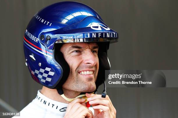 Mark Webber of Australia and Infiniti Red Bull Racing prepares to drive guests around in an Infiniti road car during the Top Gear Festival at Sydney...