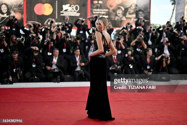 Alice Campello poses on the red carpet before the opening ceremony of the 80th International Venice Film Festival, on August 30 at Venice Lido.