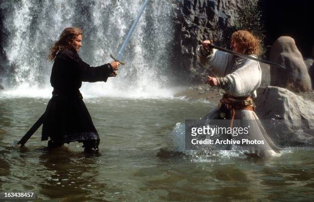 Dennis Quaid in sword fight with David Thewlis in a scene from the film 'DragonHeart', 1996.