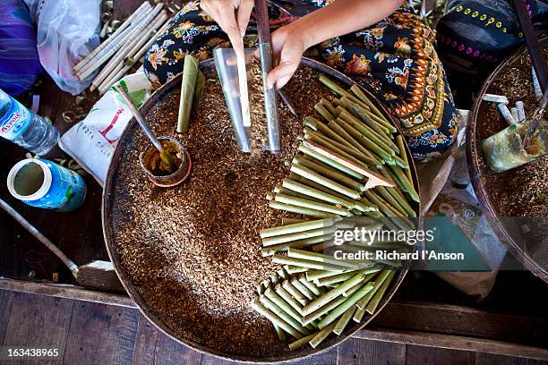 young woman making cheroots - cheroot making stock pictures, royalty-free photos & images