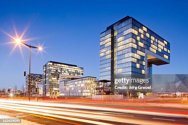 office buildings at dusk - cologne stock pictures, royalty-free photos & images