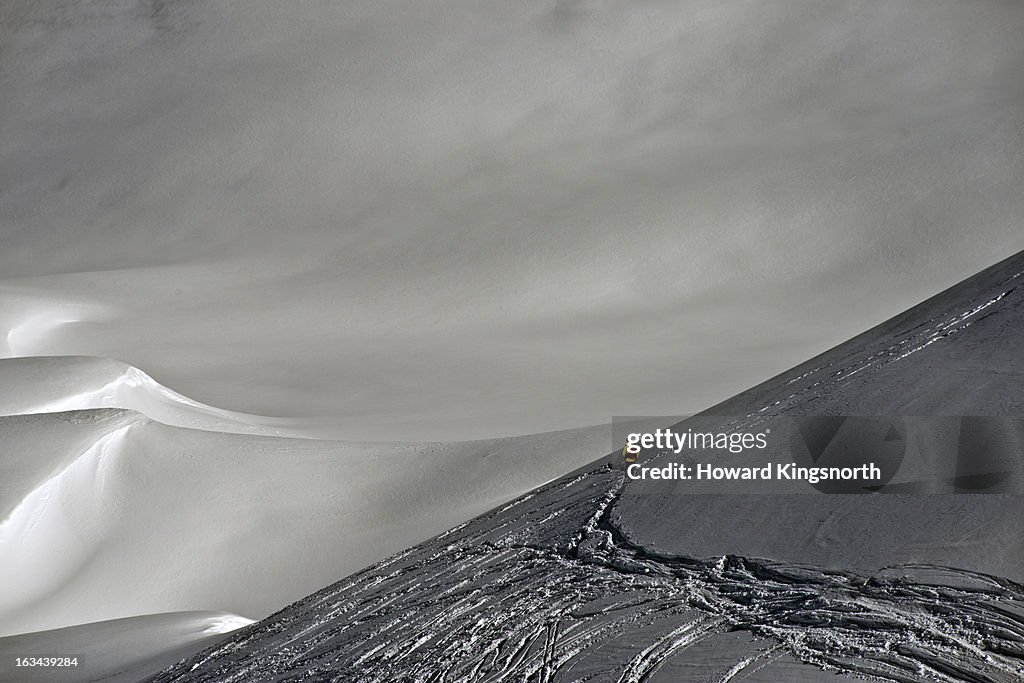 Lone skier in mountain landscape