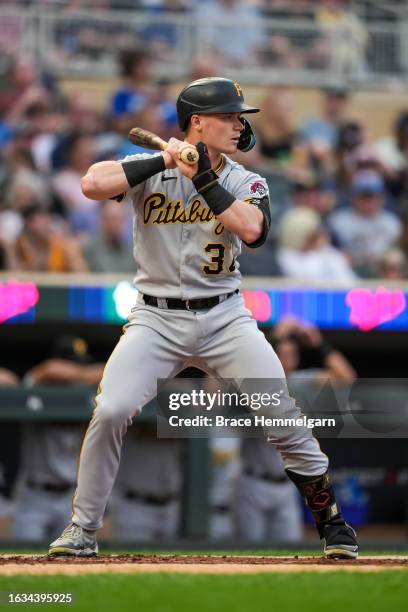 Henry Davis of the Pittsburgh Pirates bats against the Minnesota Twins on August 18, 2023 at Target Field in Minneapolis, Minnesota.