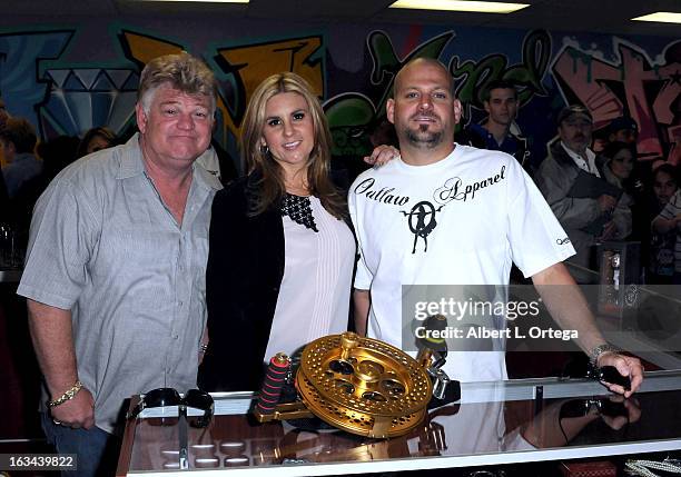 Personalities Dan Dotson, Brandi Passante and Jarrod Schulz attend the "Storage Wars" Cast Store Opening held at Now & Then Second Hand Store on...