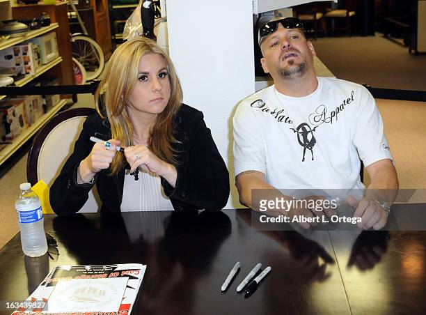 Personalities Brandi Passante and Jarrod Schulz attend the "Storage Wars" Cast Store Opening held at Now & Then Second Hand Store on March 9, 2013 in...