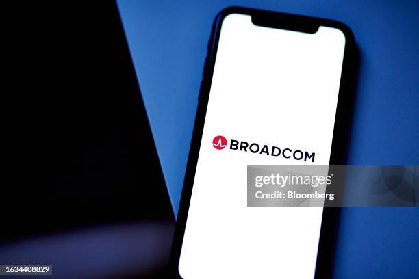 The Broadcom logo on a smartphone arranged in New York, US, on Wednesday, Aug. 23, 2023. Broadcom Inc. Is scheduled to release earnings figures on...